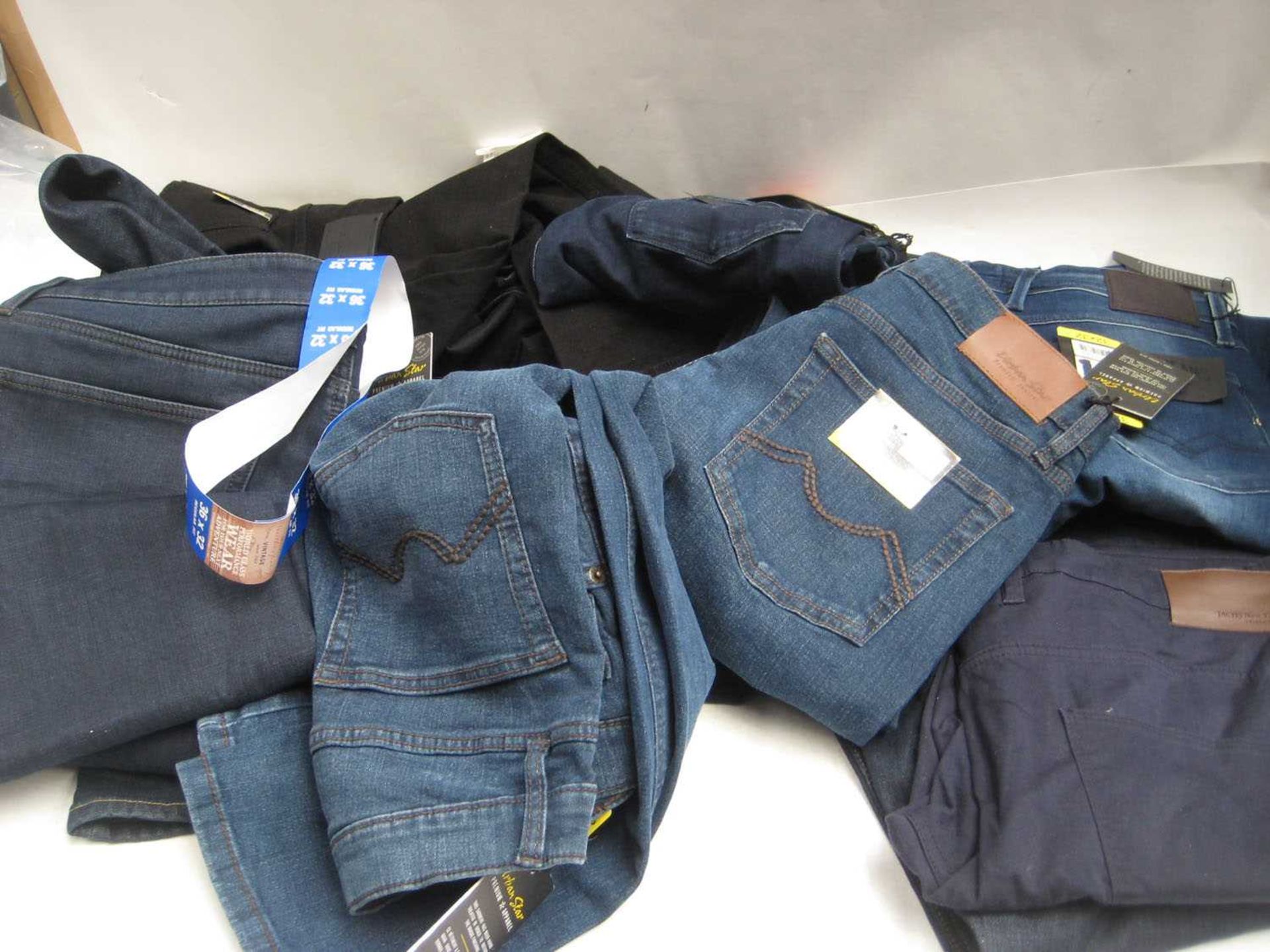 +VAT A bag containing Men's Jeans in various sizes, including Jachs, Replay, Urban Star