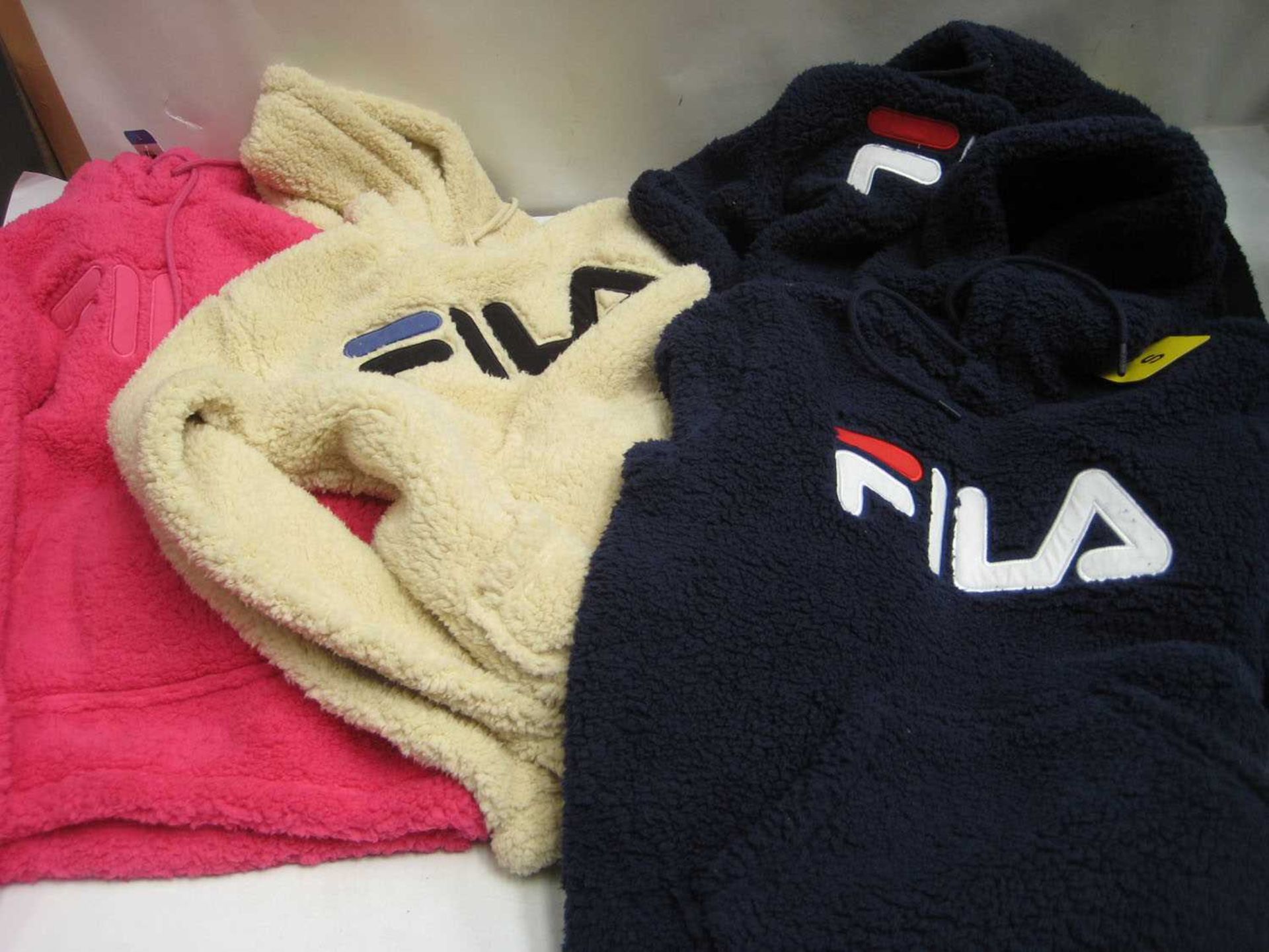 +VAT A bag containing 4x Ladies Fila Fleece Hoodies in various sizes, 2x Navy, 1x Pink, 1x Cream