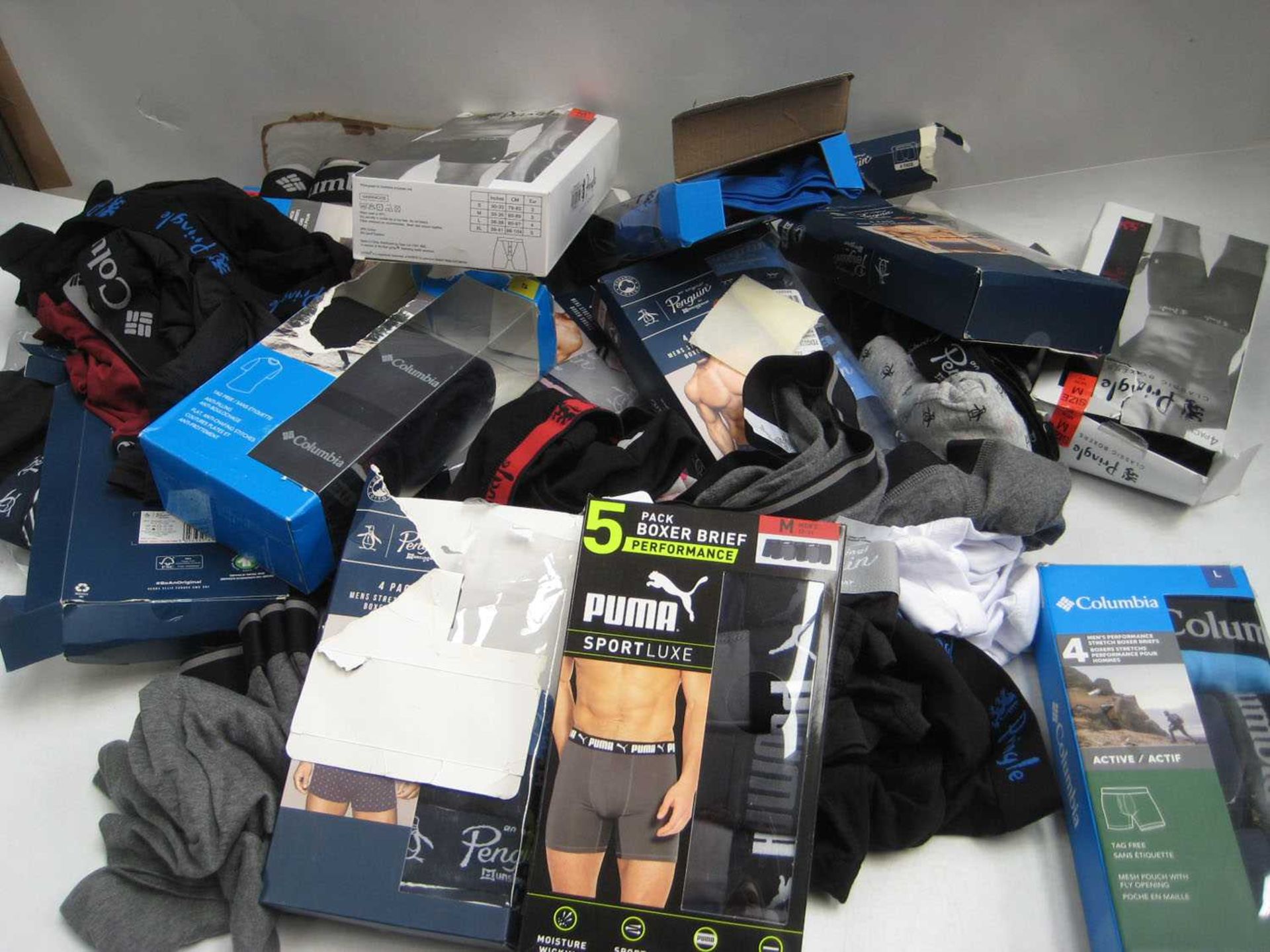 +VAT A bag containing Men's Underwear in various sizes, including Puma, Columbia, Pringle