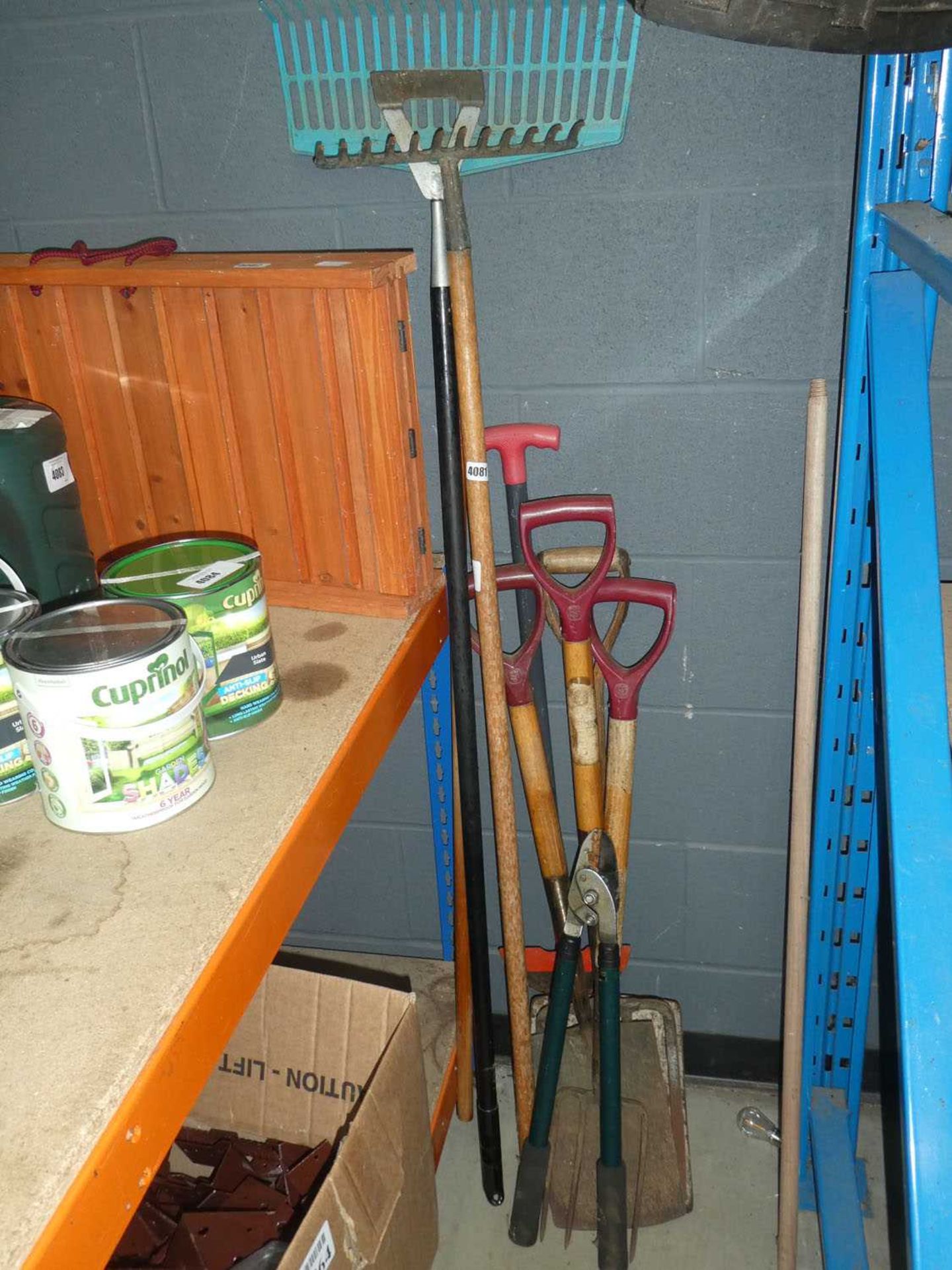 Small quantity of garden tools inc. shovel, fork, rake, etc.