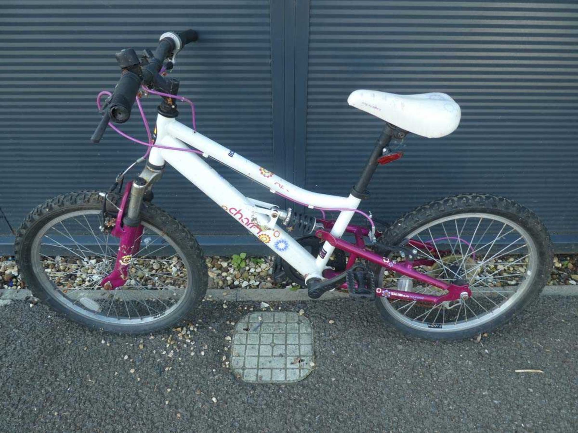 White and pink girls bike