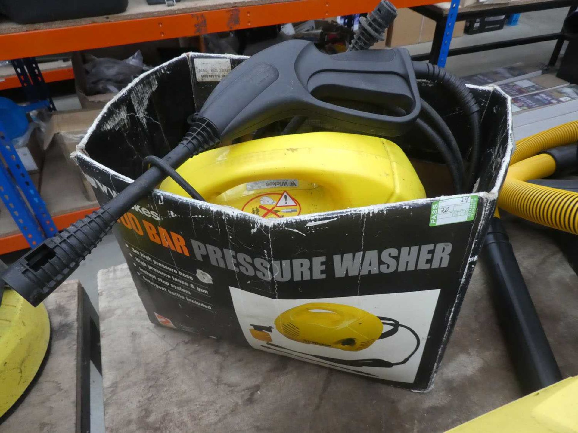 Small yellow electric pressure washer