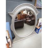 Silver framed oval mantle mirror