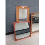 A 1960/70's teak framed square wall mirror, 54 x 54 cm, together with a 1970's laminate mirror (2)