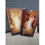 2 canvases making 1 picture of wine glass and flowers