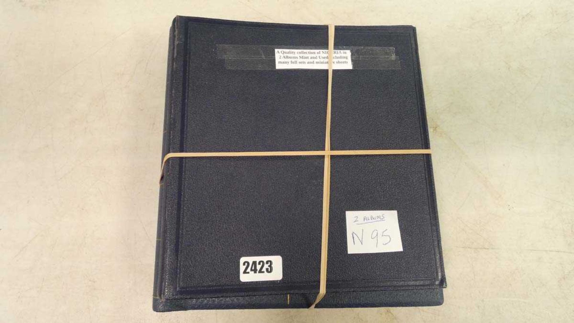2 binders containing quantity of Nigerian stamps