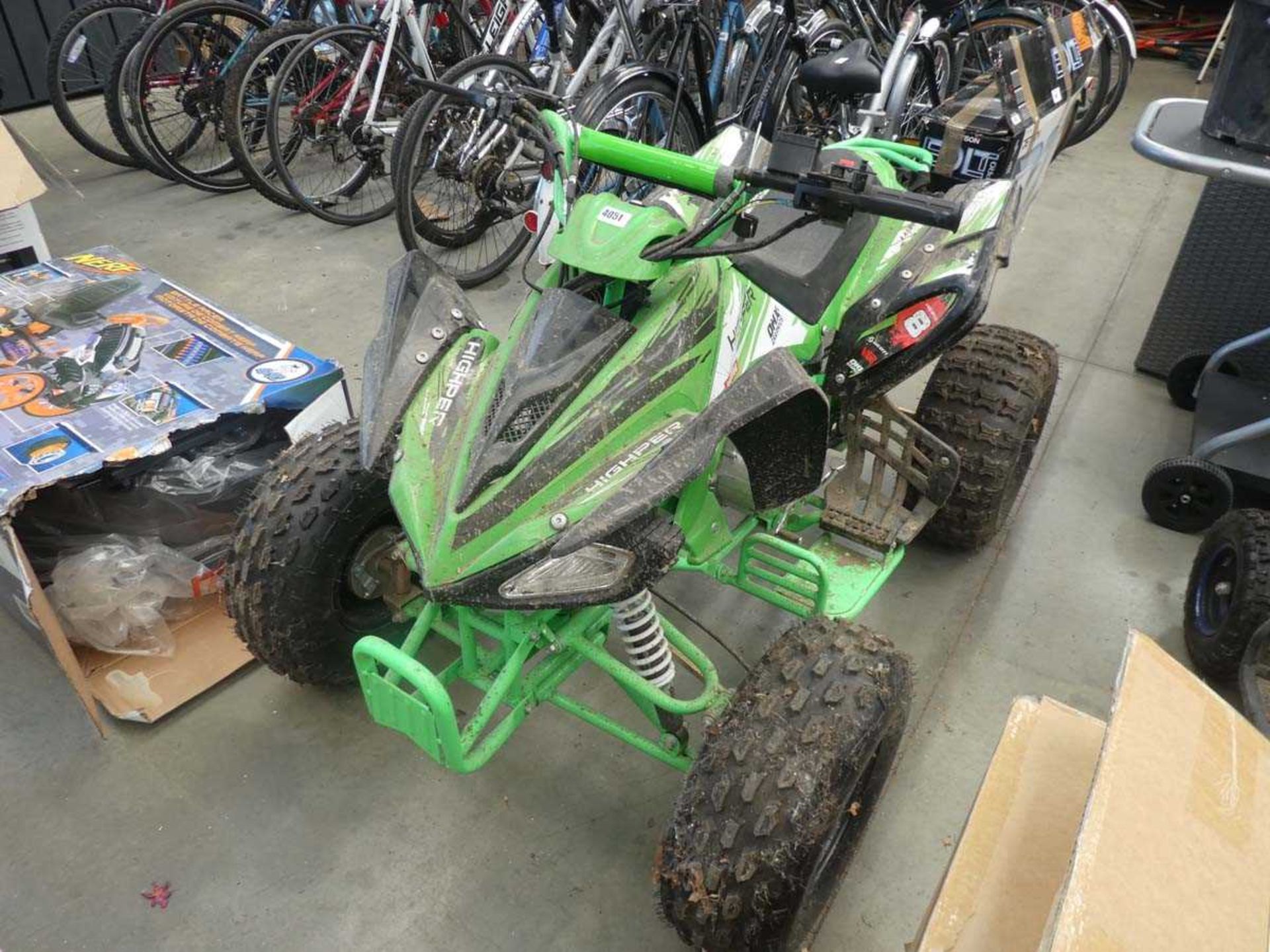 Hyper green petrol powered quadbike