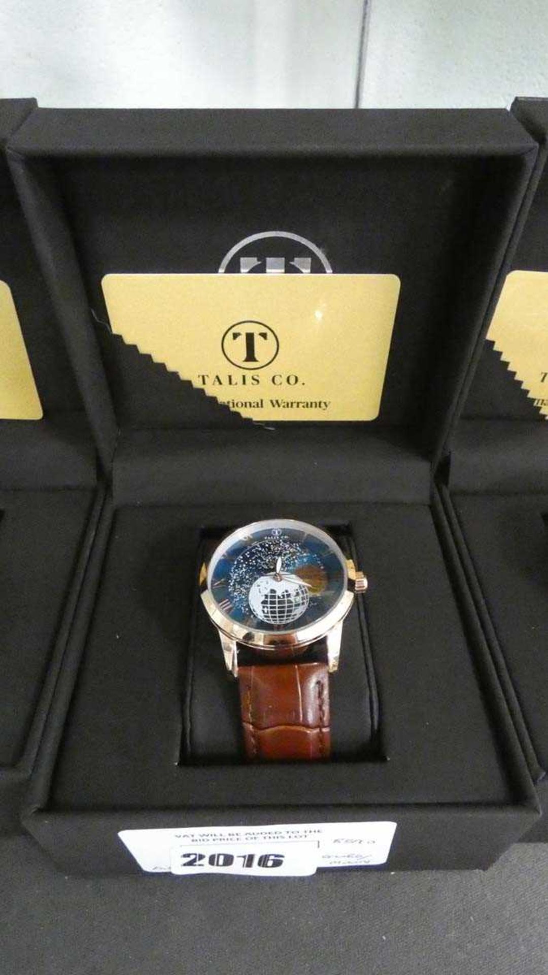 +VAT Talis Co roman numeral dial face wrist watch with moon phase dial