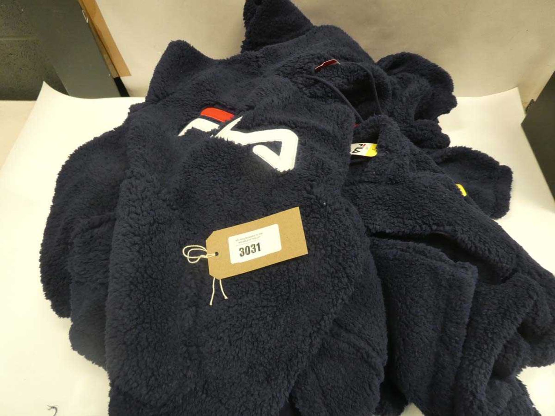 +VAT Bag containing navy Fila fluffy hoodies, various sizes