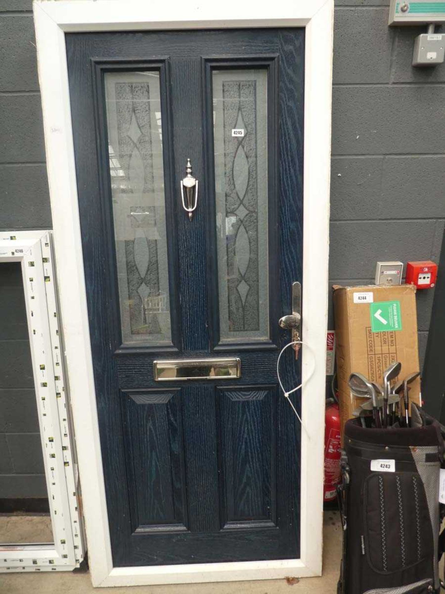 Blue UPVC part glazed door with frame