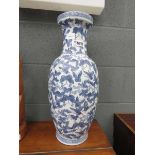 Blue and white butterfly decorated vase