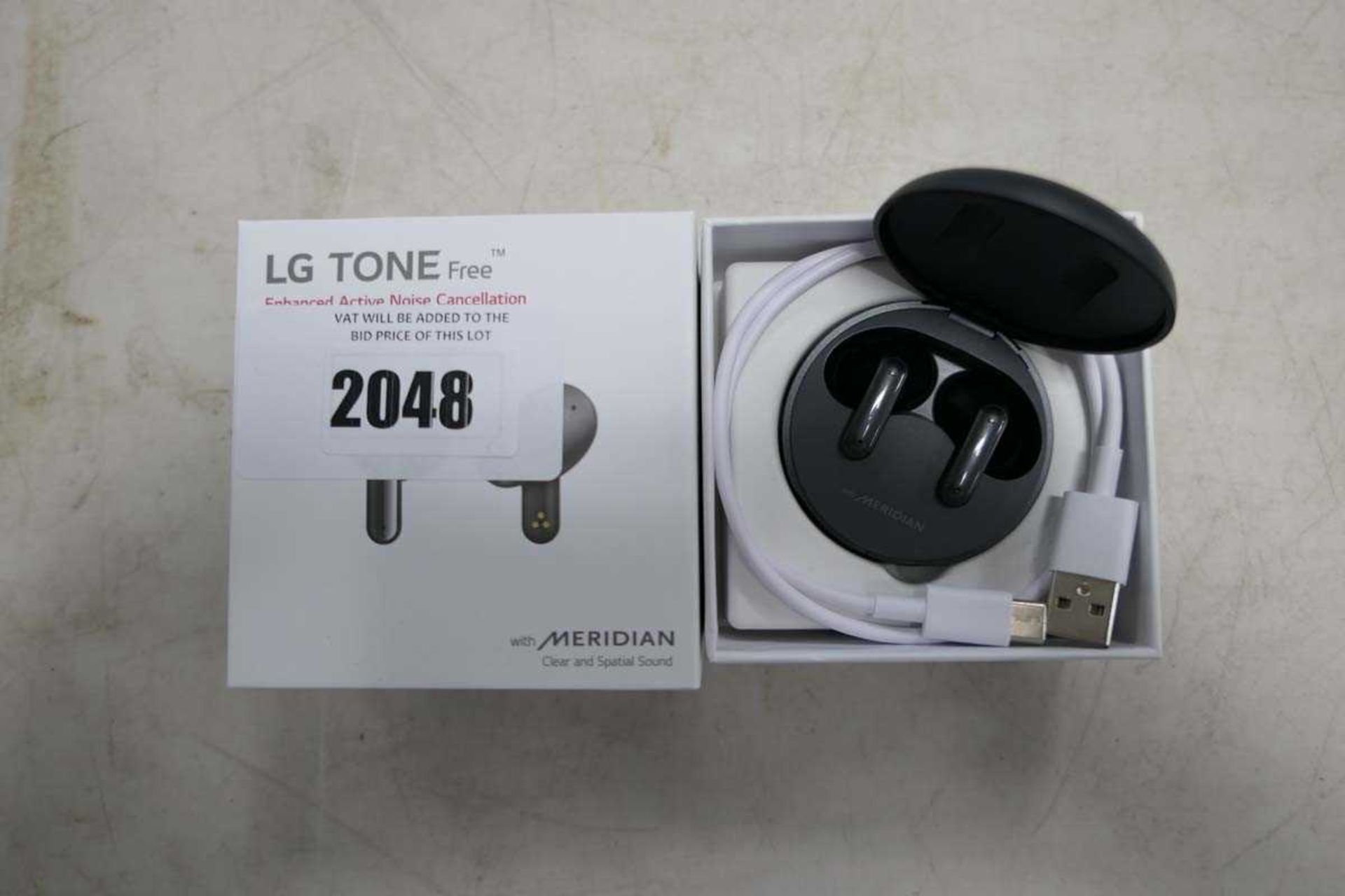 +VAT LG Tone Free earbuds with charging case and box