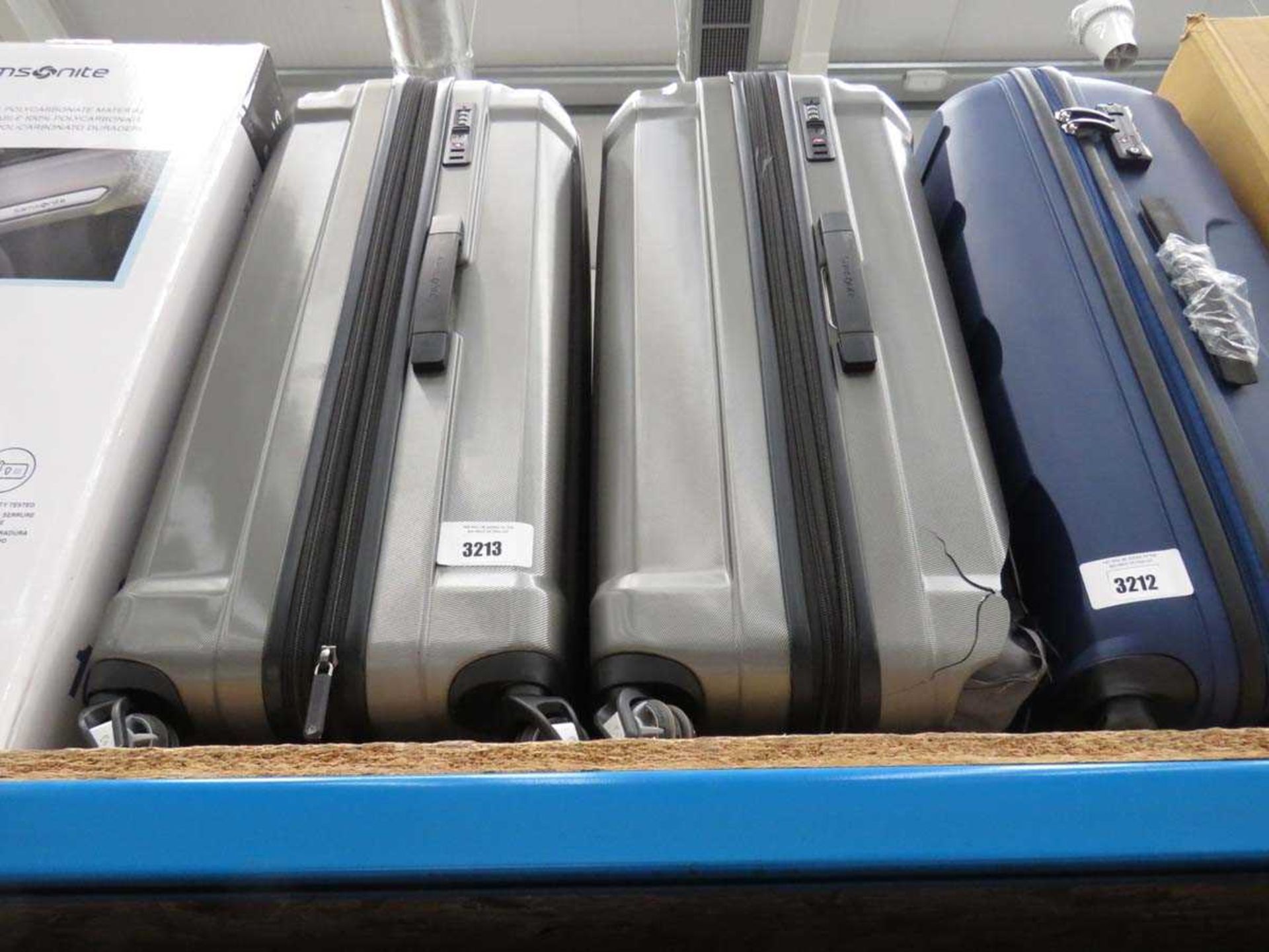 +VAT 2 large hard-shelled Samsonite suitcases