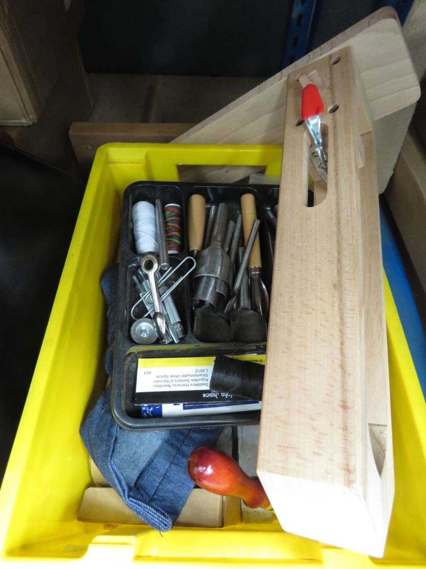 Box containing string reels, crafting tools, etc.