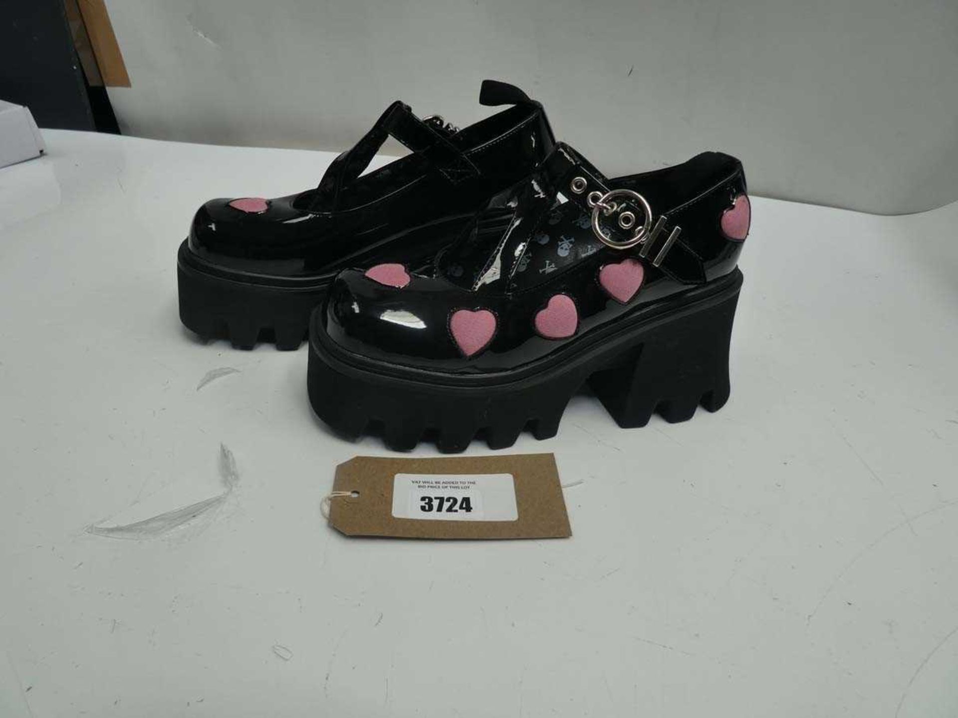 +VAT Pair of Lamoda platform shoes in black with pink hearts, size 6