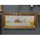 Large framed and glazed watercolour of man on lake signed G Grey