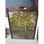 Oil of canvas of a lakeside scene in carved dark wood frame