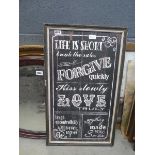 Chalkboard advertising love and forgiveness