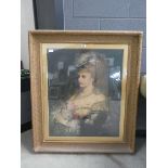 Framed and glazed print of a lady with bouquet of flowers