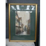 Framed and glazed picture of a river and street side scene