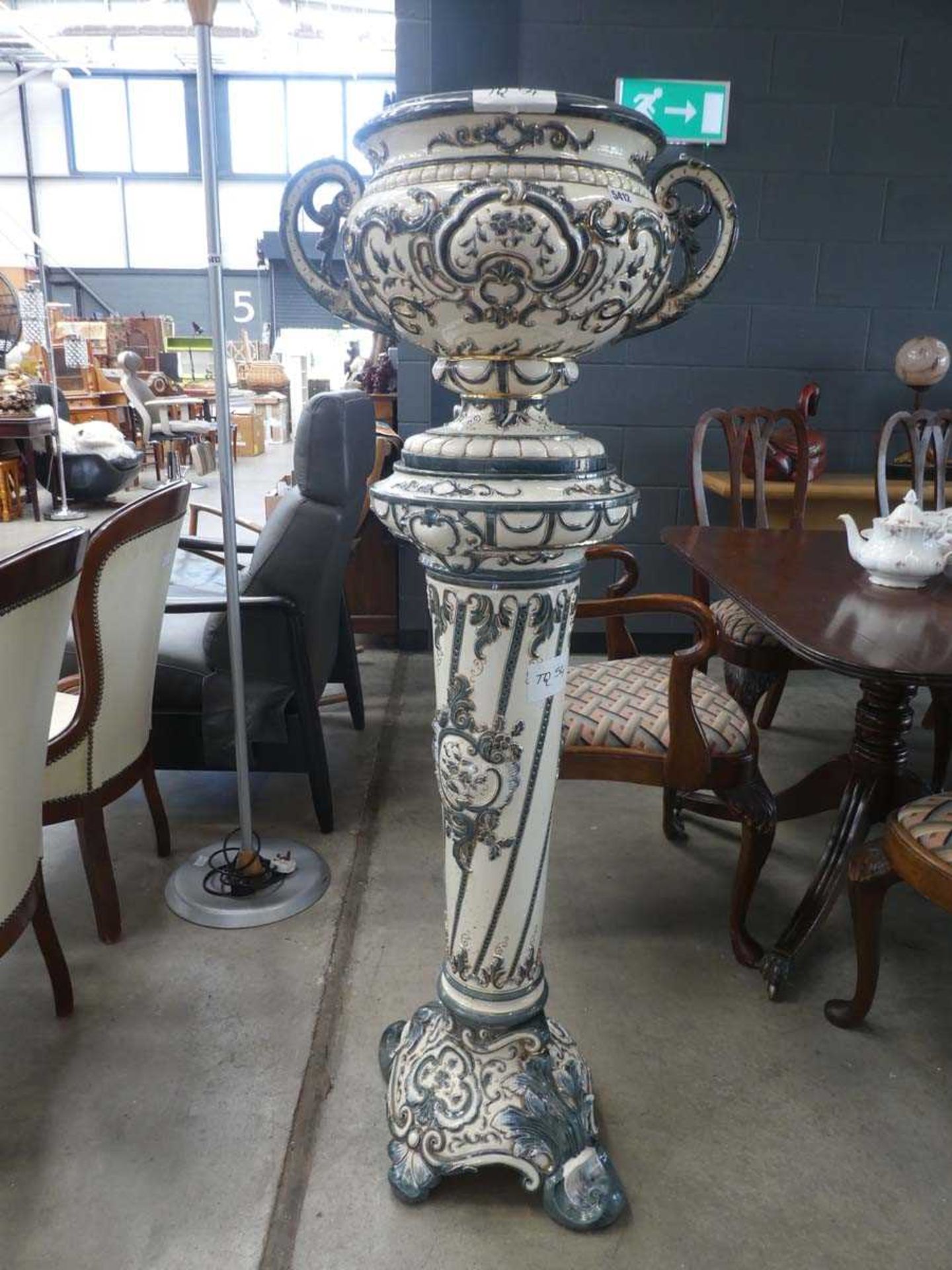 Large ceramic jardiniere of floral and scrolled pattern