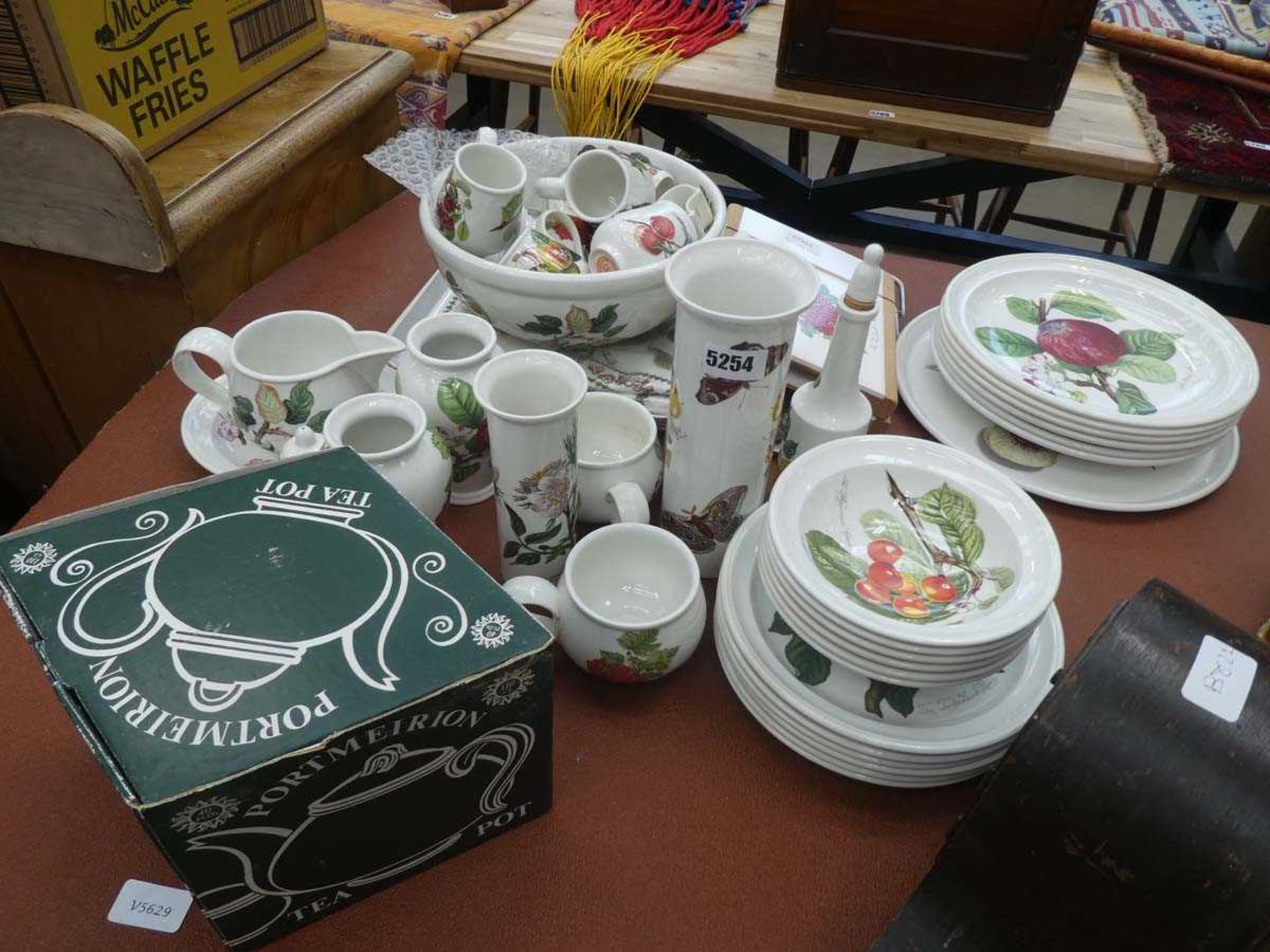 Large quantity of Portmeirion china incl. flower vases, bowls, cream jugs, teapot, etc.