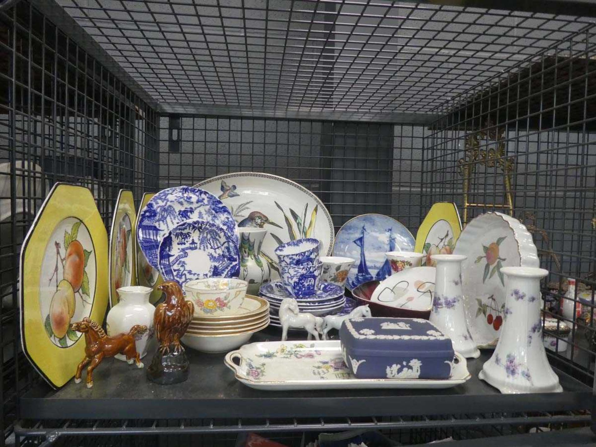 Cage containing assorted china incl. Wedgwood, Jasperware, Beswick drinks bottles, blue and white