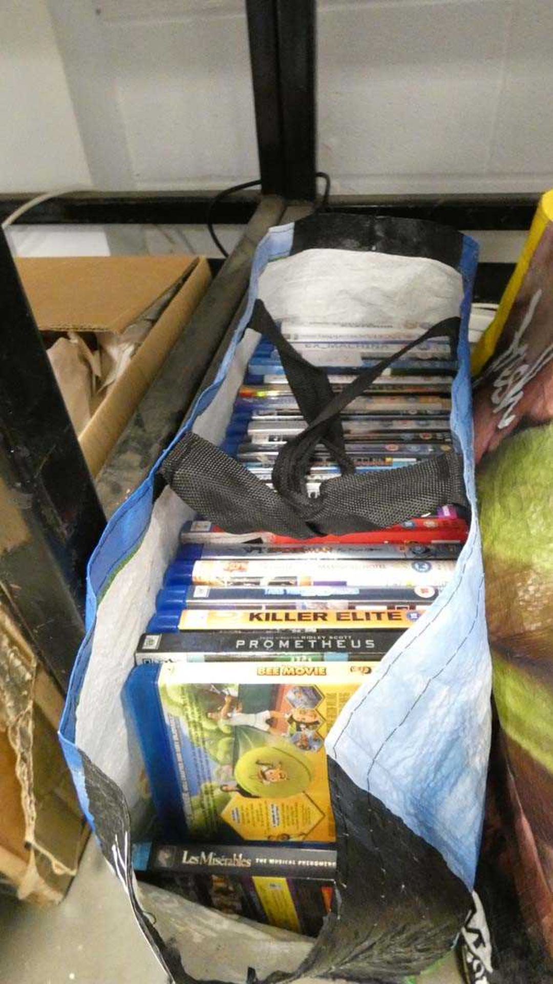 Bag containing a large quantity of blu-ray discs