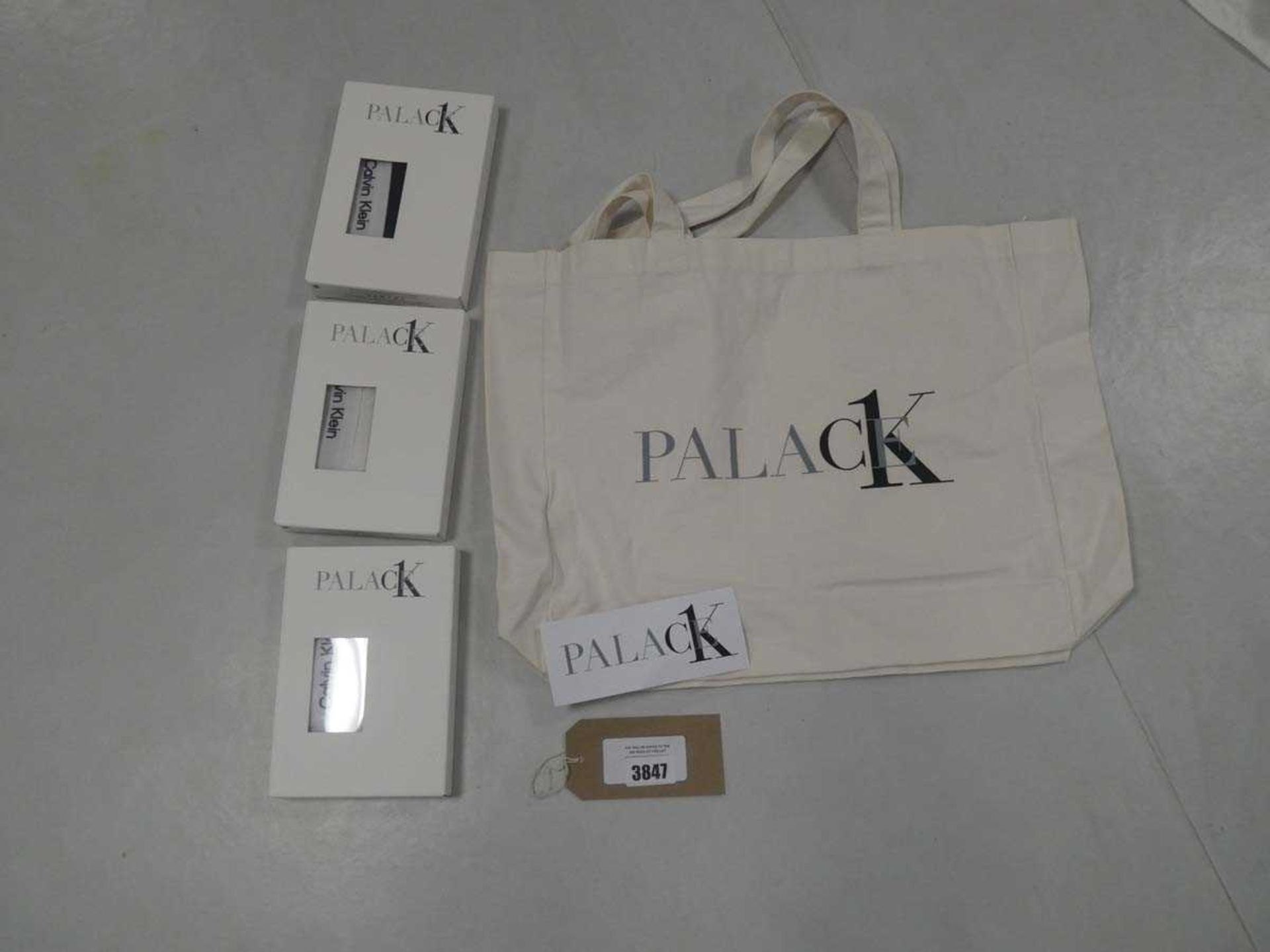 +VAT Calvin Klein x Palace tote bag with two boxed Calvin Klein x Palace bralettes and one boxed