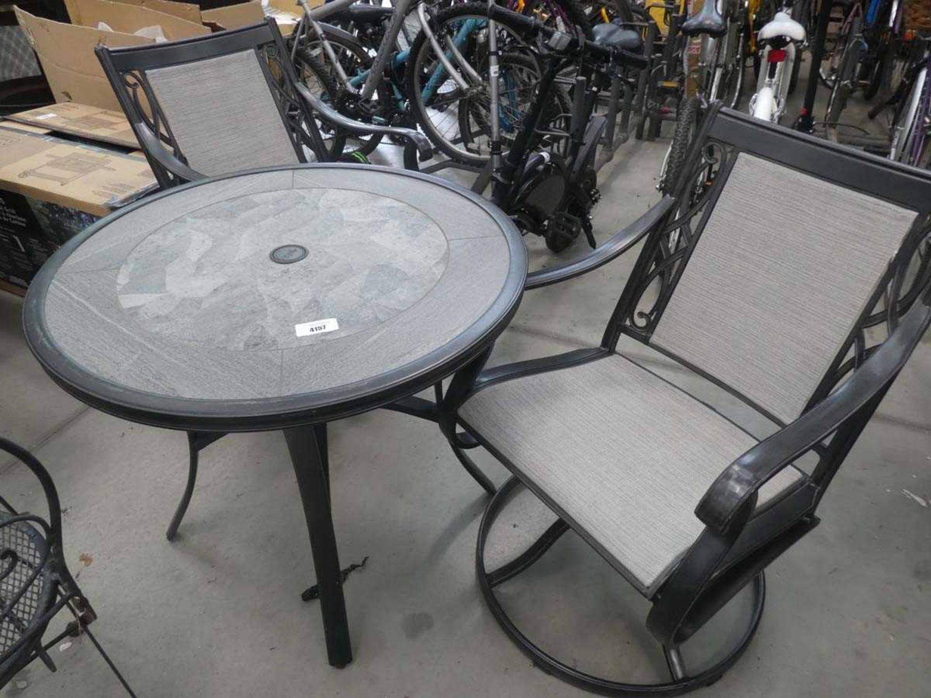 +VAT Round tiletop garden table and 2 swivel chairs