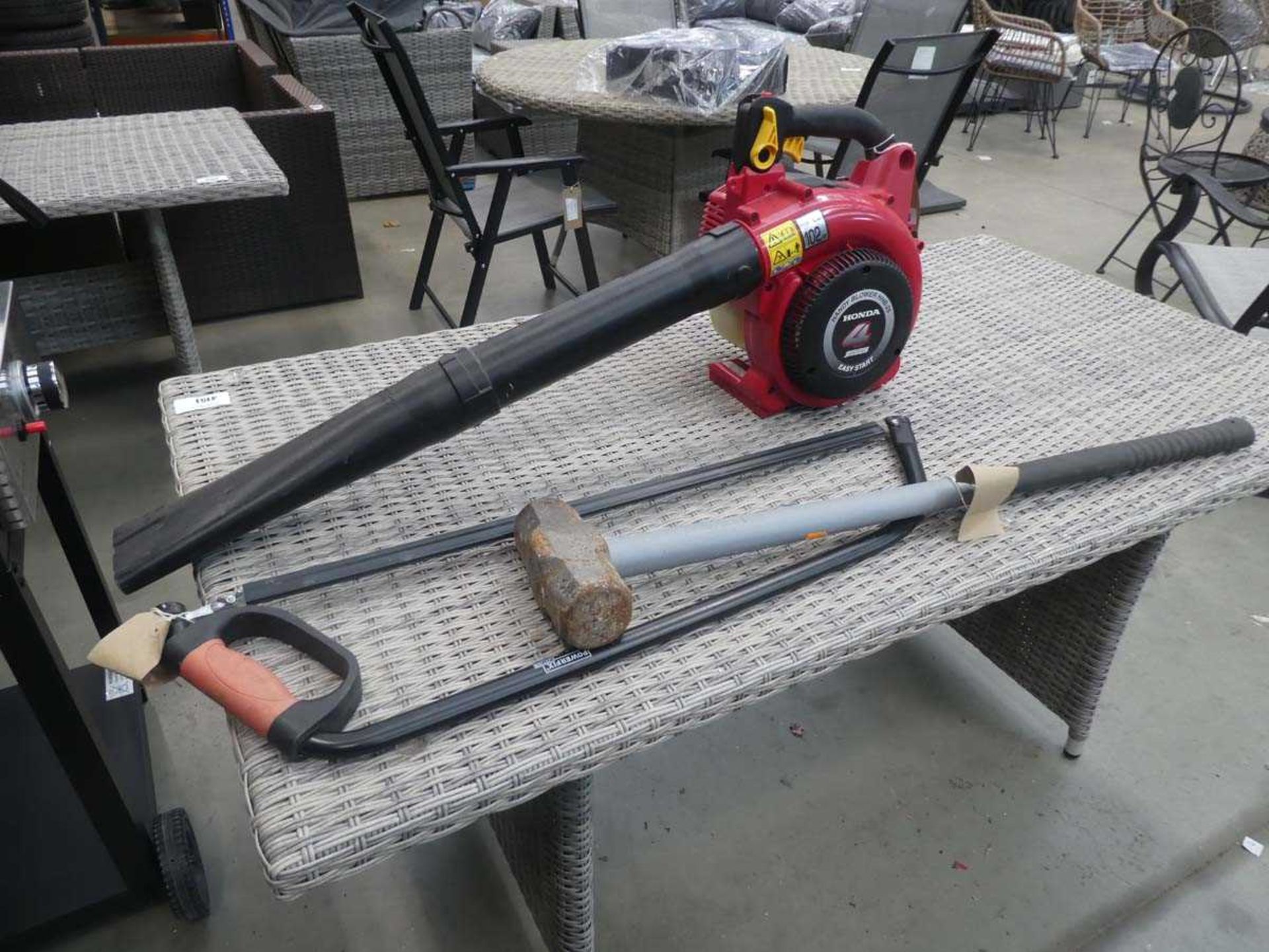 Honda petrol powered leaf blower with hand saw, and sledgehammer