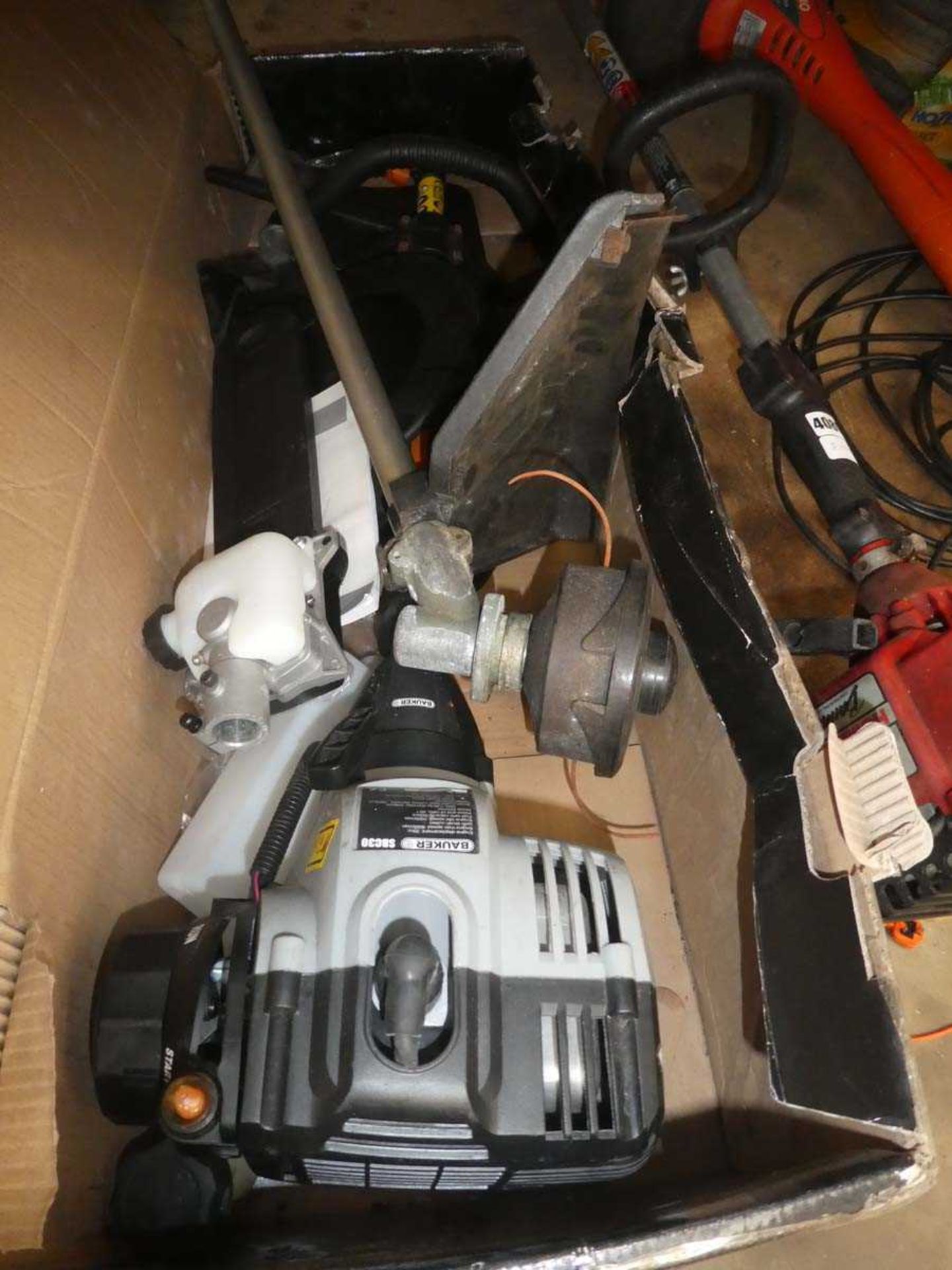 Bauker petrol powered multi tool in box with strimmer and chainsaw attachment
