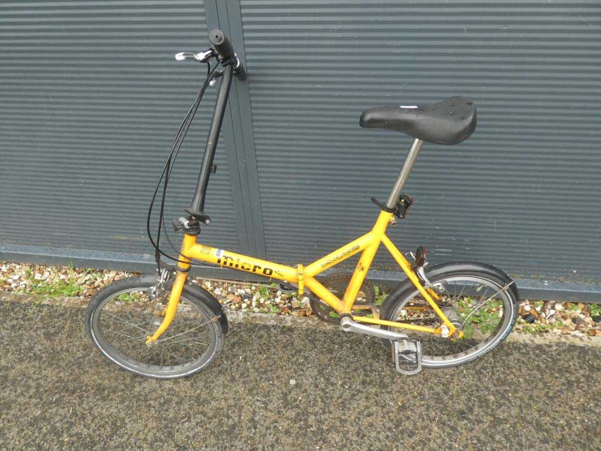 Yellow micro folding bike