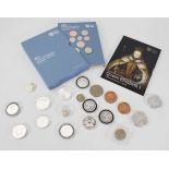 A group of coins including a silver 1 ounce Britannia dated 2019, two Battle of Britain