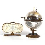 A West German 'sputnik' desktop barometer together with a Swiza clock-barometer (2)These items do