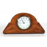 A 1920's French mantel clock retailed by Mappin & Webb, the enamelled dial with Arabic numerals,