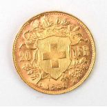 A Swiss 20 franc coin dated 1935