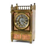 A late 19th/early 20th century mantel clock, the movement stamped 1466 and striking on a gong, the
