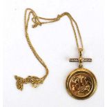 A Royal Mint limited edition half sovereign necklace suspended on a 9ct yellow gold mount and