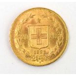 A Swiss 20 franc coin dated 1896