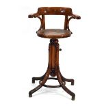 An early 20th century Austrian bentwood beech stool with a pressed seat, adjustable column and