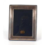 A late 20th century silver easel back photograph frame of rectangular form, Carrs, Sheffield 1994,
