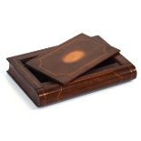 An Edwardian mahogany and strung puzzle box modelled as a book, 19 x 13 cm