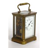 An early 20th century brass and five-glass carriage timepiece