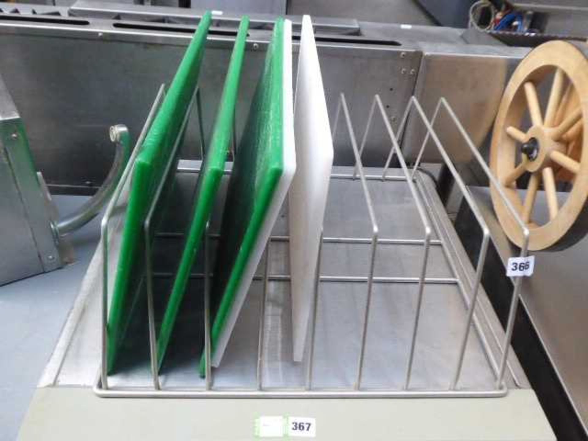 3 green and 2 white heavy duty chopping boards with rack