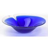 A Swedish full-lead glass bowl with a royal blue centre and translucent border, by Mats Jonasson, d.