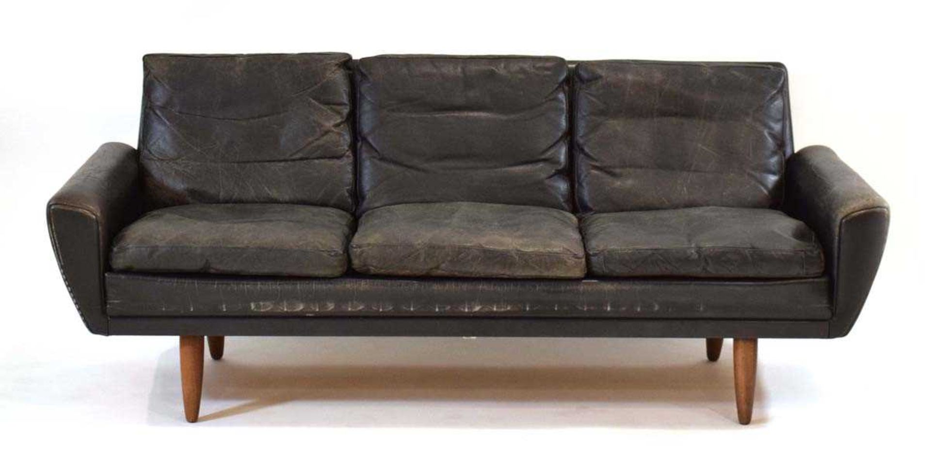 A 1960's Danish black leather three-seater sofa on teak tapering legs*Sold subject to our Soft - Image 2 of 6