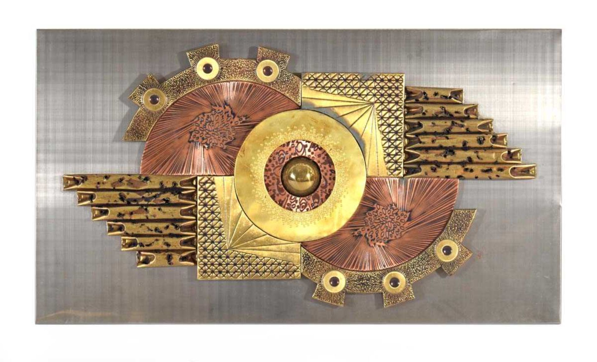 A 1970's wall sculpture by Stephen Chun of Hong Kong, polished aluminium mounted with copper and