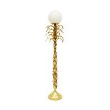 A 1970's French gilt lacquered floor lamp in the form of a palm tree surmounted by a glass