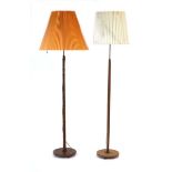 Two 1960's Danish turned teak standard lamps with associated shadesSee images. Leads cut. Working